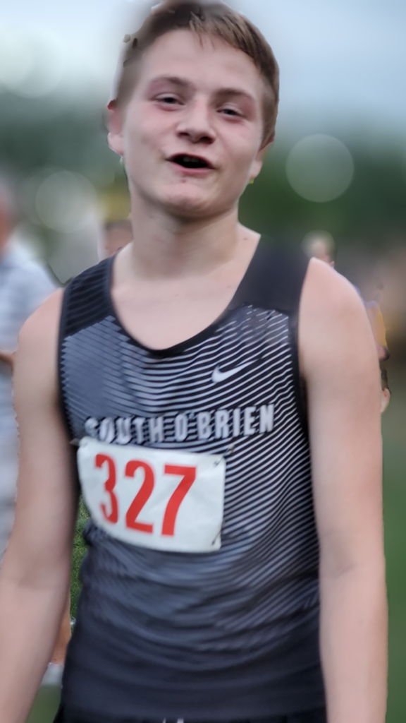 A picture of Tressa's son in his cross country uniform